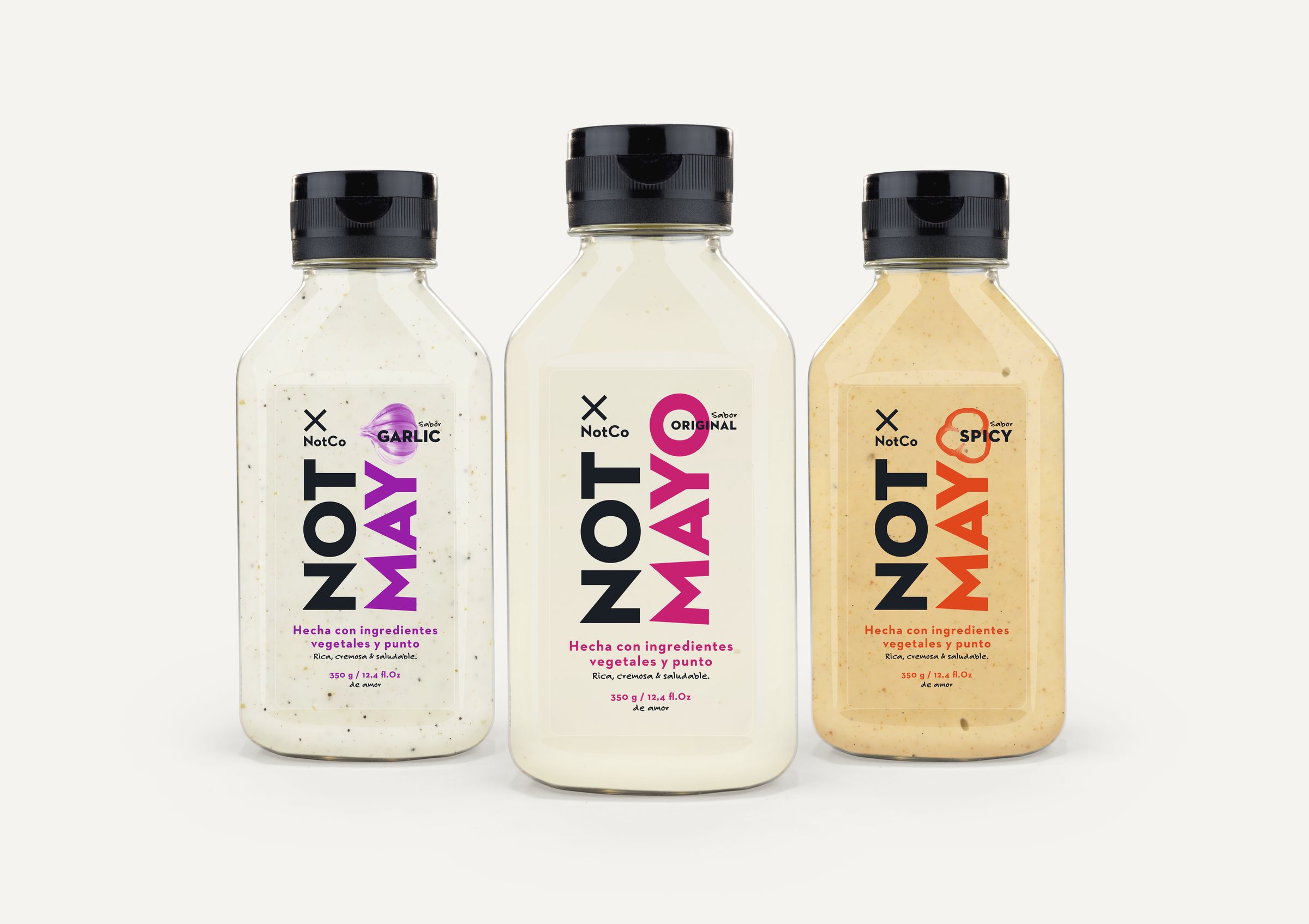 Familia de NotMayo en dosificador: Garlic en violeta, Original en magenta y Spicy en naranja.